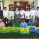 Bupati Natuna Cen Sui Lan menyerahkan bantuan di Desa Tanjung Balai Pulau Tiga