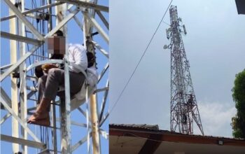 Polsek Sekupang melakukan evakuasi pria yang memanjat tower di samping Masjid Baiturrahman Sekupang Batam.