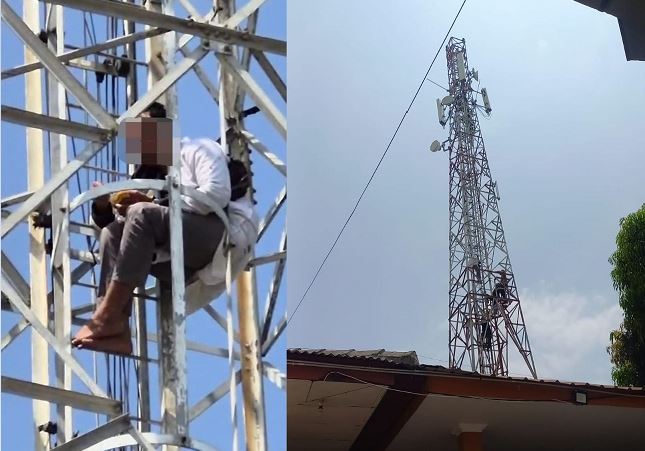 Polsek Sekupang melakukan evakuasi pria yang memanjat tower di samping Masjid Baiturrahman Sekupang Batam.