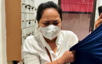 Tersangka penggelapan Carolein Parewang saat diamankan di Mapolresta Barelang