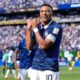 Kylian Mbappe berselebrasi dengan gaya khasnya setelah mencetak gol penentu kemenangan Prancis atas Senegal di Piala Dunia 2026.