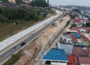 Pekerjaan peningkatan Jalan Gajah Mada Batam segmen Landing Point Fly Over menuju Simpang Lalan Madani yang dikerjakan BP Batam.